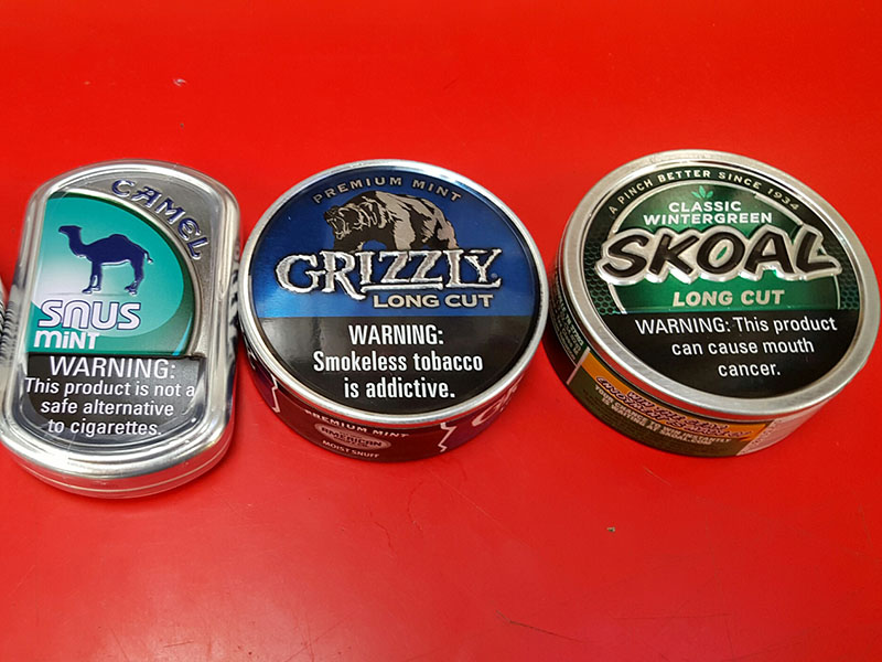 Can You Bring Nicotine Pouches and Chewing Tobacco on Planes? 1 Chewing tobacco snuff cans