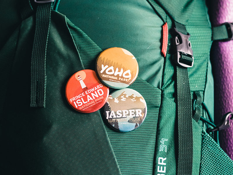 Can You Bring Decorative Pins and Badges on Planes? 1 Decorative pins and badges on a backpack