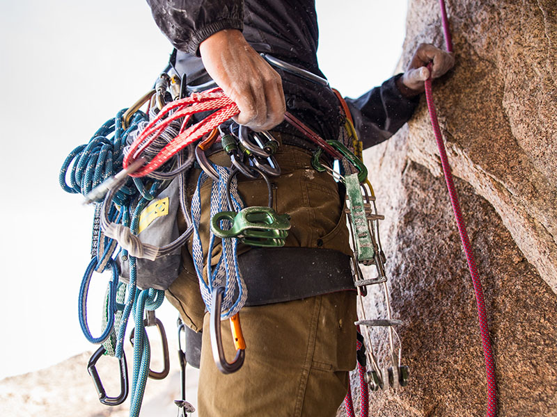 Can You Bring Climbing Gear on Planes? 1 Rock climber with climbing gear