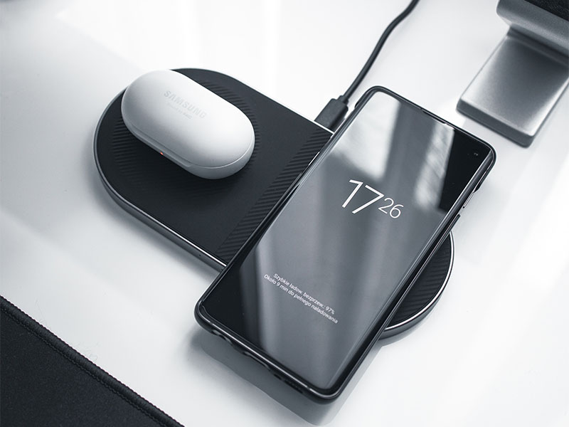 Can You Bring Mobile Phone and Laptop Chargers on Planes (Corded & Wireless)? 1 Charging an iphone with a wireless phone charger